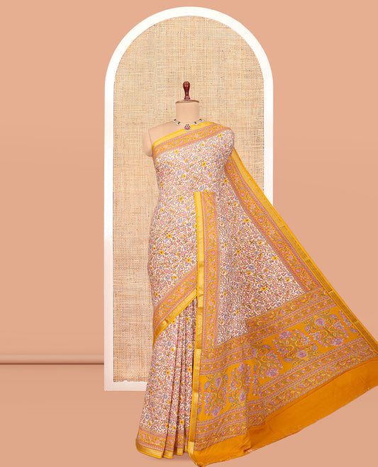 Off White Printed Silk Saree, Decorated with Floral-Vine Print, a Contrast Traditional Zari Border, Floral Pallu, and a Contrast Blouse