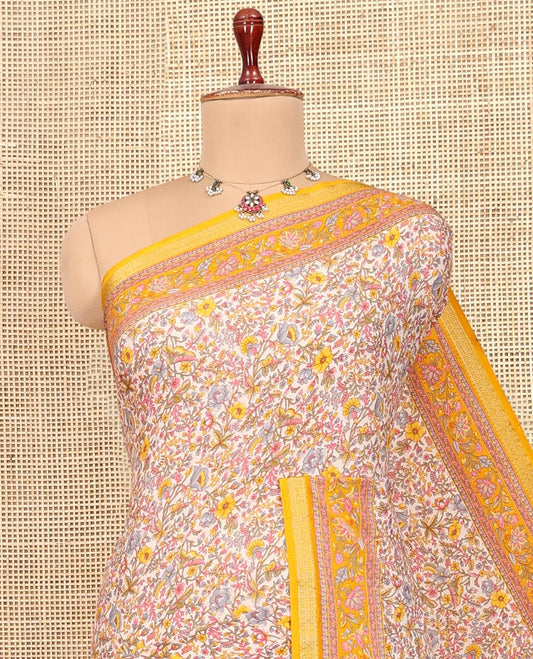 Off White Printed Silk Saree, Decorated with Floral-Vine Print, a Contrast Traditional Zari Border, Floral Pallu, and a Contrast Blouse
