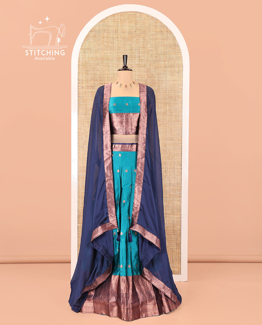 Rama-Navy Blue Semi-Banarasi Half-Saree Features Buttas on Skirt, a Contrast Traditional Zari Border, a Matching Blouse, and a Contrast Satin Georgette Dhavani