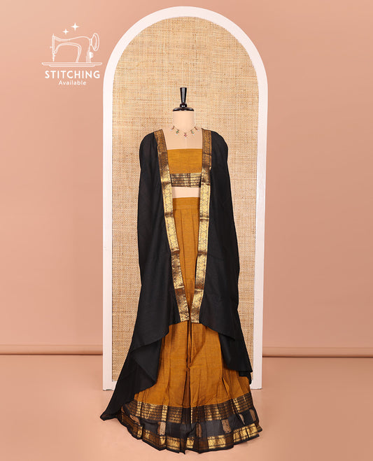 Mustrad and Black Sungudi Cotton Half-Saree Featuring Plain Skirt, Adorned with a Contrast Traditional Motifs Woven Zari Border of Annam Motifs, Paired with a Matching Blouse, and Contrast Syska Georgette Dhavani with Zari Border