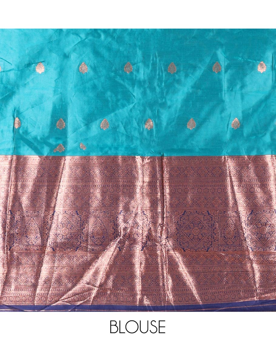 Rama-Navy Blue Semi-Banarasi Half-Saree Features Buttas on Skirt, a Contrast Traditional Zari Border, a Matching Blouse, and a Contrast Satin Georgette Dhavani