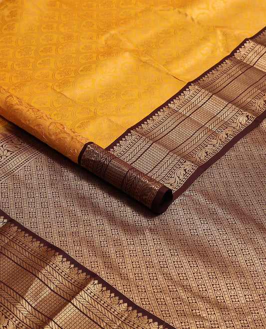 Orange floral jaal design kancheepuram silk saree with contrast border of thilakam mokku, banaras, muthu design & zari design pallu