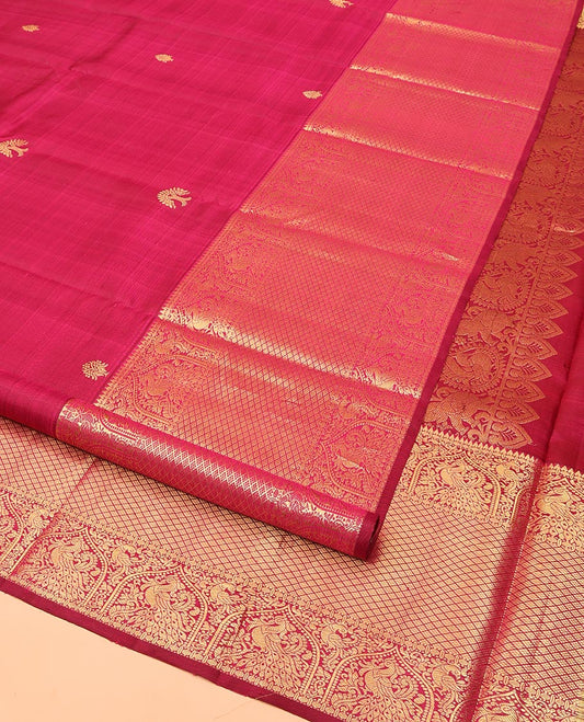 Purple Kanchipuram Silk Saree, Meticulously Crafted with Zari Buttas All Over Its Body, Highlighted by a Zari Border of Rekku, Paisa, Mayil, and Jaal Designs, Pallu of Ogee Patterns, and Paired with a Matching Blouse