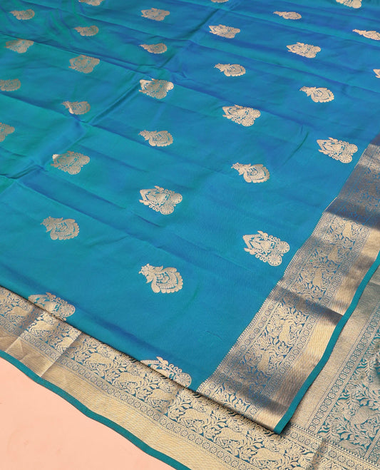 Blue Vasundhara Lite Silk Mix Saree, Elevated with Zari Buttas All Over Its Body, Highlighted by Zari Border of Kathir, Kamalam, and Maan Designs, Grandly Decked Up Pallu and Paired with a Matching Blouse