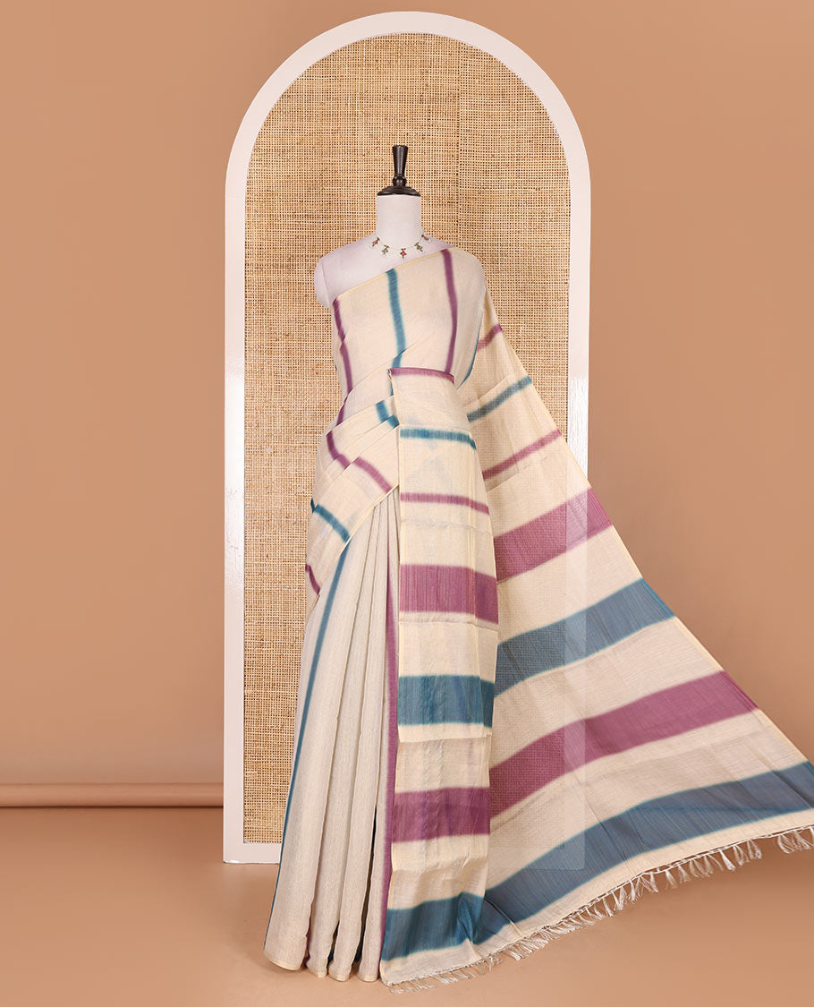 Borderless cream, colorful striped tissue saree, unique motifs printed blue color blouse