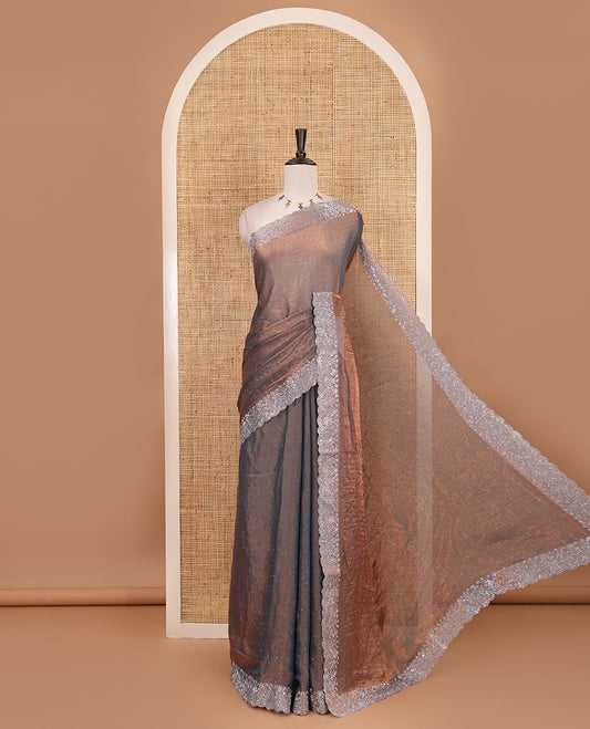 Grey Swarovski crystal stone embedded fendy chiffon saree, scallop border accentuated with floral and scallop design in Swarovski stones