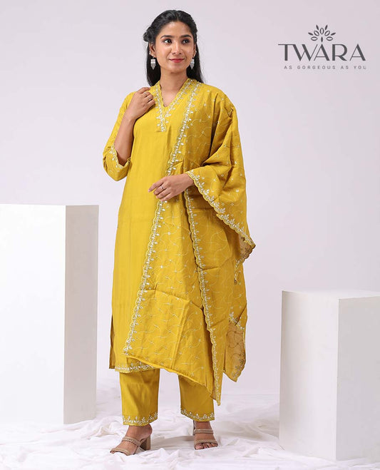Twara mustard floral embroidery v neck, 3/4th sleeve, below knee lenght kurti with straight pants & floral embroidered scallop border dupatta