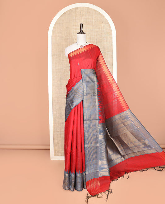 Red Dupion Silk Saree Featuring Geometric Buttas All Over Its Body, Highlighted by a Contrast Temple Border of Checked Patterns, Pallu Steeped with Zari Stripes, and Paired with a Contrast Blouse