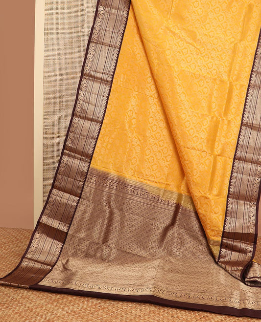 Orange floral jaal design kancheepuram silk saree with contrast border of thilakam mokku, banaras, muthu design & zari design pallu