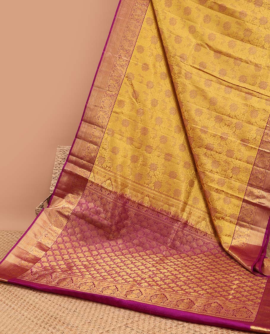 Yellow floral design kancheepuram silk saree with contrast floral zari border & ogee zari design pallu