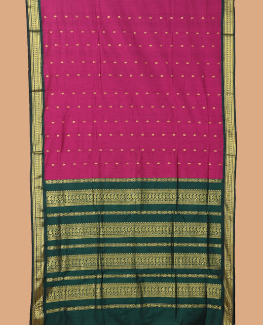 Pink buttas nine-yard cotton saree, contrast traditional zari border, and pallu of traditional designs