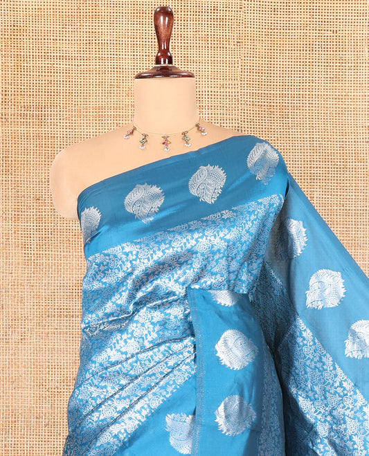 Blue Art Kanchi Silk Saree Features Jacquard Design, a Zari-Motif Border, Contrast Intricate Pallu, and a Contrast Blouse