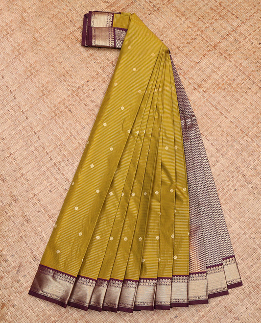 Green Budget Silk Saree, Steeped in Richness of Zari Buttas and Zari Stripes All Over Its Body, Complemented by a Contrast Traditional Zari Designs Woven Border, Grand Jaal Pallu, and Paired with a Contrast Blouse