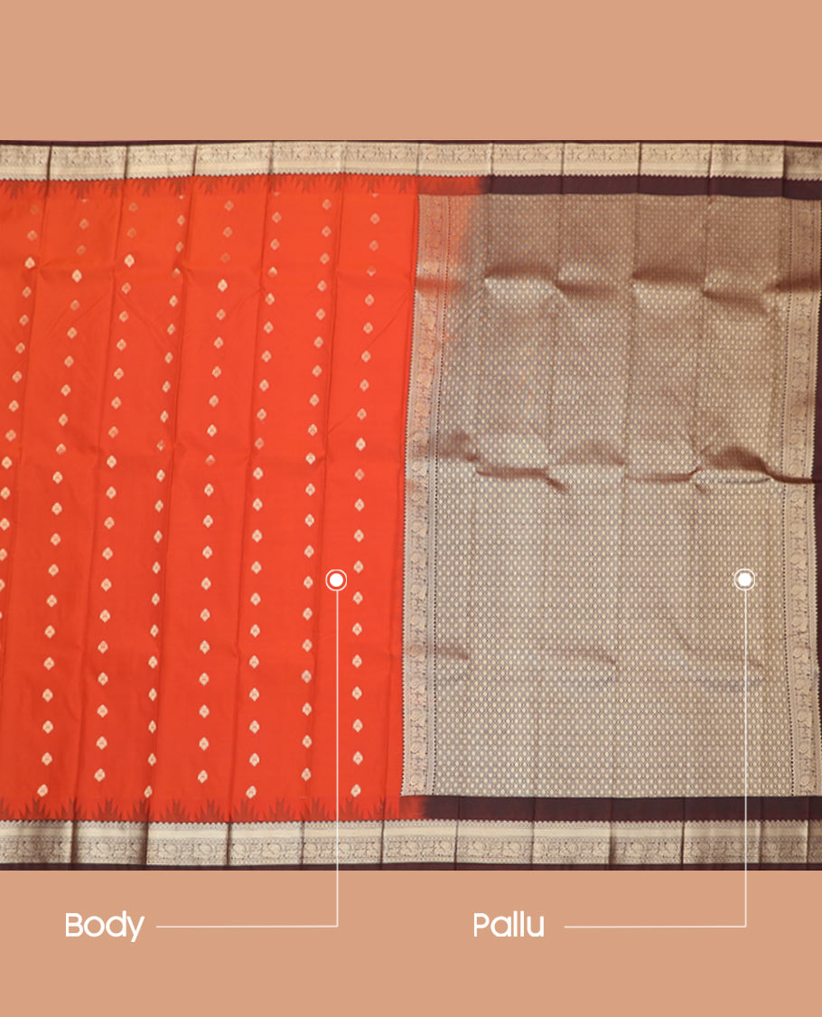 Orange buttas budget silk saree, contrast temple traditional border of peacock designs, and jaal pallu