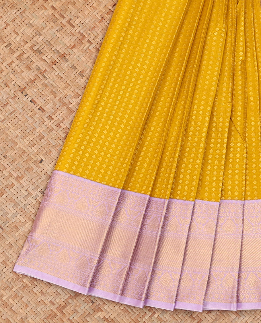 Yellow Budget Silk Saree Prettified with Butta Enclosed Sparsely Checks, Highlighted with a Contrast Traditional Zari Design Border, Pallu of Jaal Design, and Paired with a Contrast Blouse