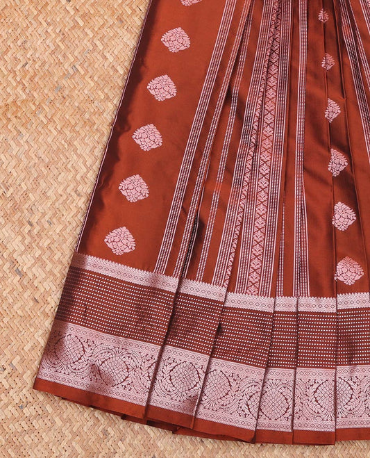Brown Budget Silk Saree, Highlighted by Zari Buttas All Over Its Body, Highlighted by a Traditional Zari Design Border, Intricately Designed Pallu, and Paired with a Matching Blouse