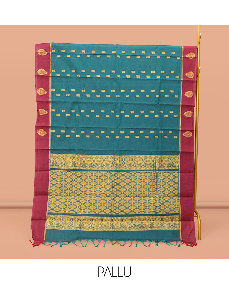 Blue Kanchi Cotton Saree, Accentuated with Buttas, Contrast Unique Motifs Woven Border, Pallu of Jaal Design, and a Matching Blouse