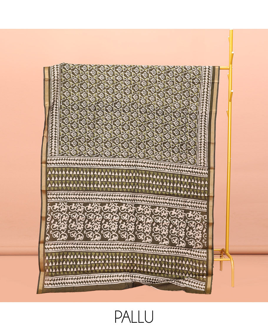 Green Kanchi Cotton Saree, Featuring Floral and Triangle Print All Over Its Body, a Subtle Border, Pallu of Floral Vine and Triangle Print, and Paired with a Contrast Blouse
