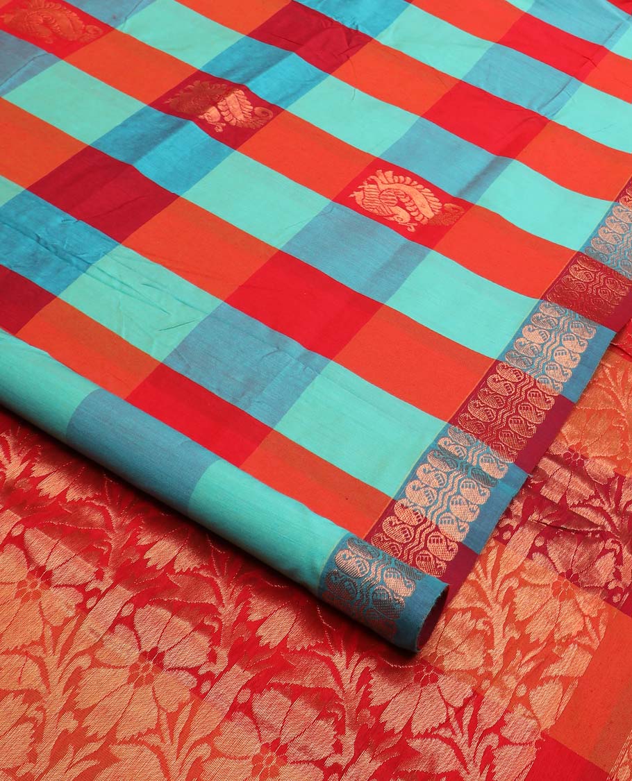 Multi-color peacock and paisley butta enclosed checked nine-yard cotton saree, traditional zari border, and floral vine zari pallu