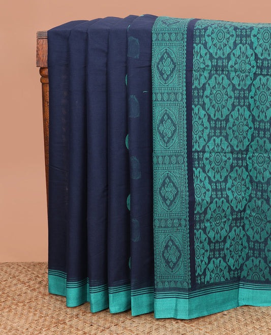 Blue polka dot buttas kanchi cotton saree, contrast border, and chakram design pallu
