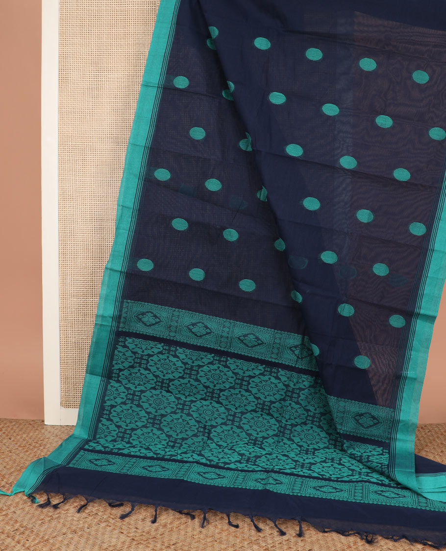Blue polka dot buttas kanchi cotton saree, contrast border, and chakram design pallu