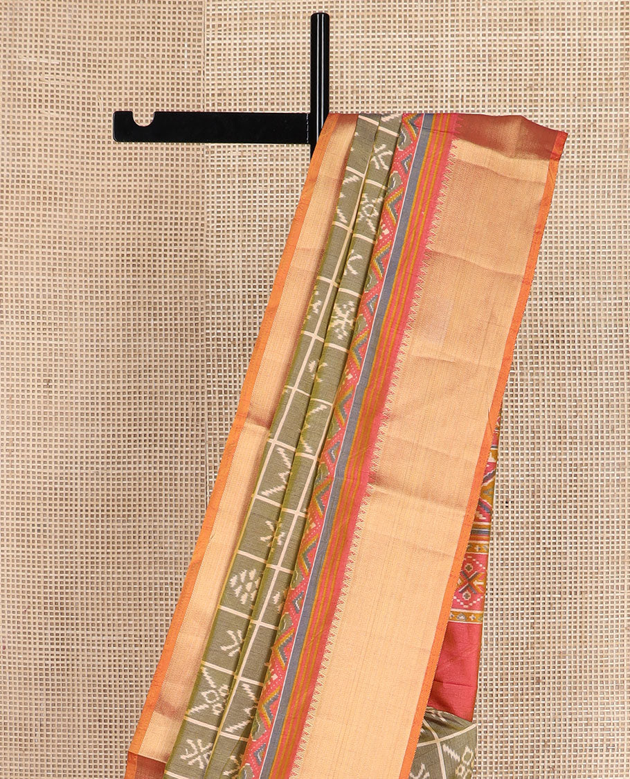Green butta enclosed checked semi-banaras patola silk saree, contrast zari border of ikkat design, and pallu steeped with geometric patterns