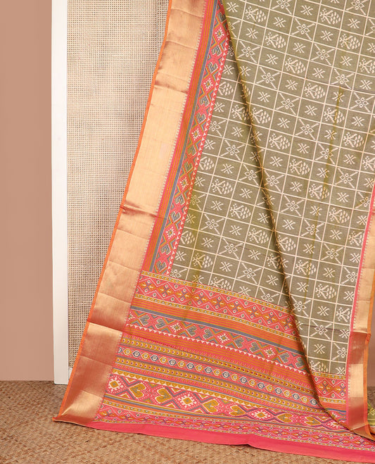 Green butta enclosed checked semi-banaras patola silk saree, contrast zari border of ikkat design, and pallu steeped with geometric patterns