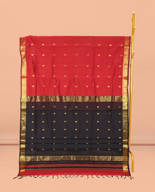 Red Maheshwari Cotton Saree, Decked Up with Buttas All Over Its Body, Highlighted by Zari Traditional Border, Complemented by a Contrast Pallu Steeped with Buttas, and Paired with a Contrast Blouse