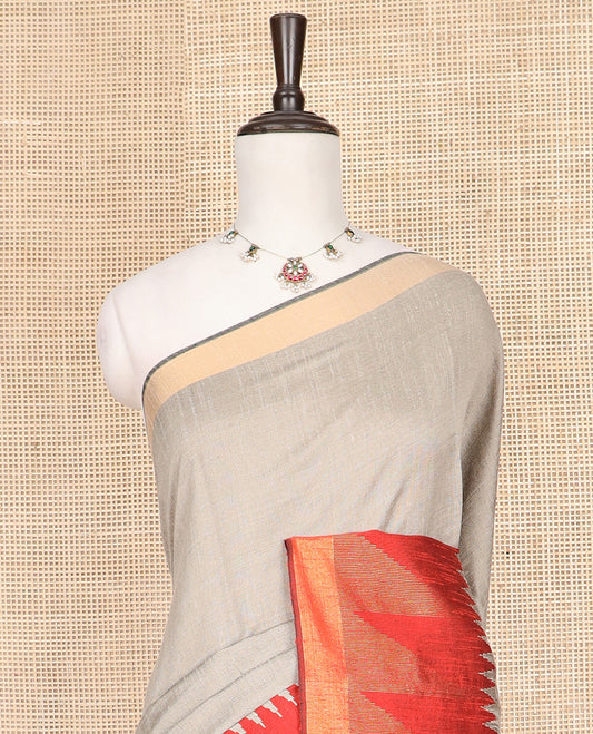 Grey Plain Dupion Silk Saree, Decorated with Contrast Temple Border, Pallu Steeped with Zari Temple Designs, and Paired with a Contrast Blouse