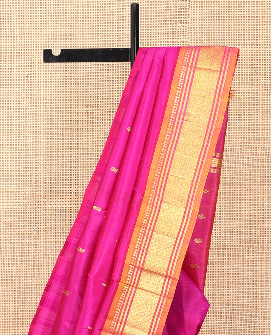 Rani Pink Kanchipuram Silk Saree Features Zari Buttas, a Contrast One-Sided Border of Paneer Sombu, Banaras, and Jaal Designs, Zari Design Pallu, and No Blouse