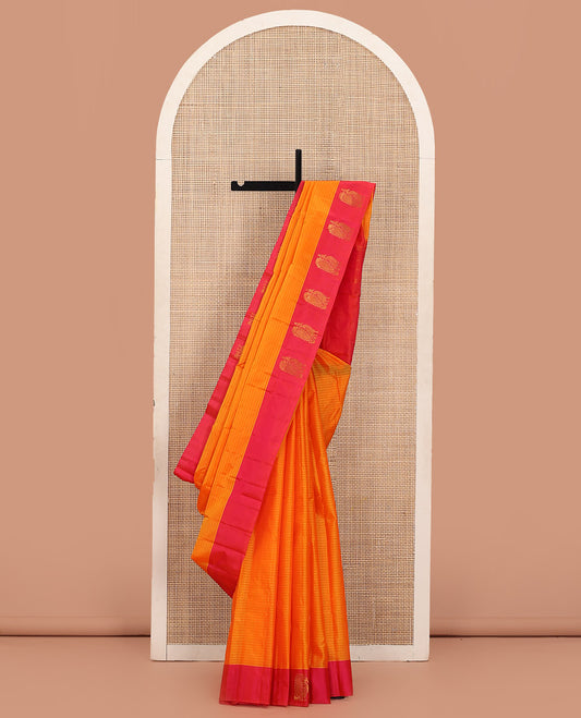 Orange Kanchipuram Silk Saree Simply Sparkled with Vazhaipoo Stripes and Zari Buttas, Complemented by Contrast Border of Mayil Designs, Contrast Pallu of Zari Buttas, and Paired with a Contrast Blouse