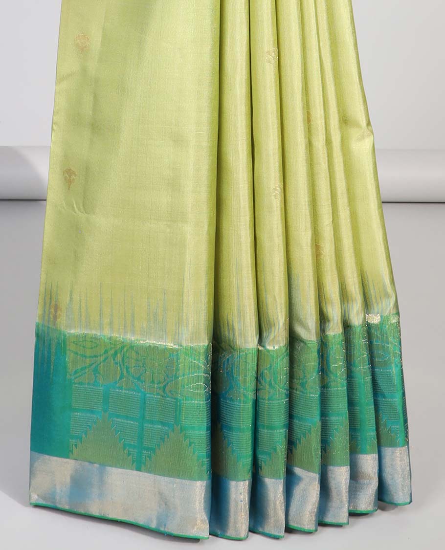 Green buttas soft silk saree with contrast floral border & ogee pattern pallu