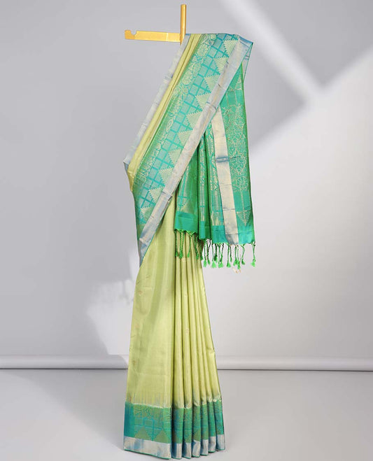 Green buttas soft silk saree with contrast floral border & ogee pattern pallu