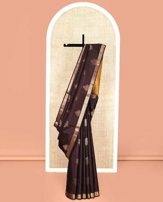 Brown Mayuri Soft Silk Saree, Elevated with Zari Buttas All Over Its Body, Highlighted by Zari Border of Manga Mokku, Banaras, Kathir, and Ara Maadam Designs, Complemented by Contrast Pallu, and Paired with a Contrast Blouse