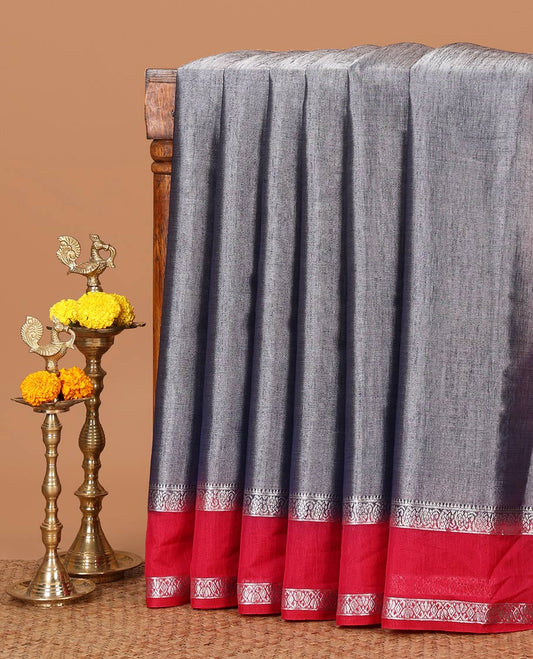 Blue plain design Tissue silk saree, contrast traditional zari border of bentex design & lined pallu with tassels