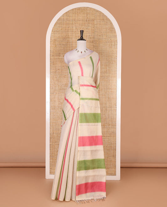 Borderless cream, colorful striped tissue saree, unique motifs printed pink color blouse