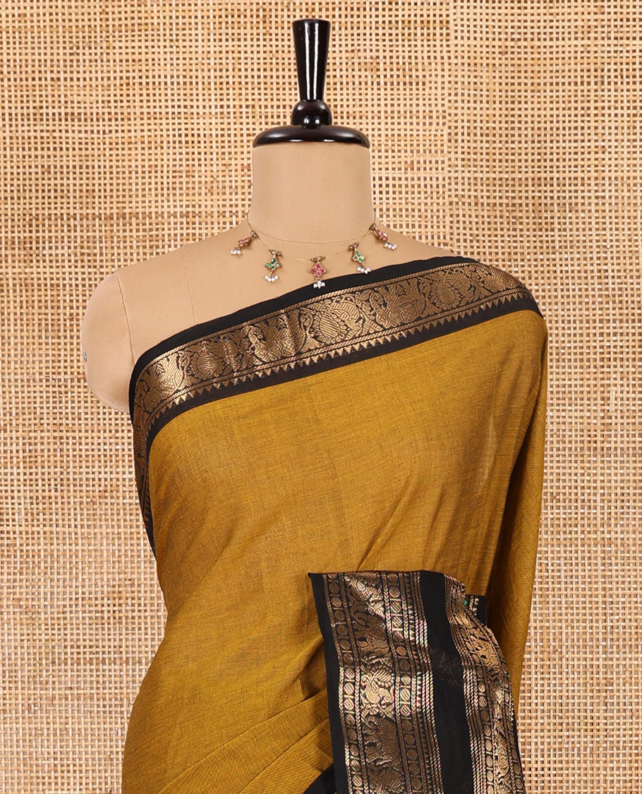 Gold plain chettinad cotton saree, contrast traditional zari temple rettai pettu border, striped pallu, and a matching blouse