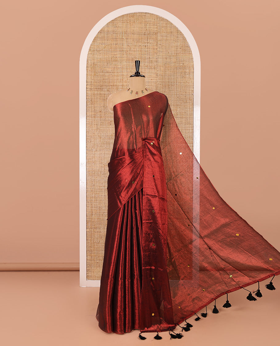 Borderless maroon mirror work khadi tissue saree, mirror work pallu, and a matching blouse