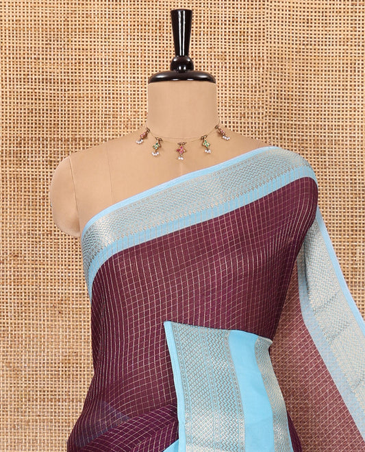 Dark violet checked moss chiffon saree with contrast traditional zari design border, checked pallu, and a contrast zari design blouse