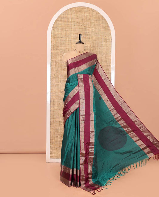 Green Soft Silk Saree, Adorned with Rudraksham Motifs All Over Its Body, Complemented by a Contrast Rettai Pettu Border, Pallu Pictures a Big Circle, and Paired with a Matching Blouse