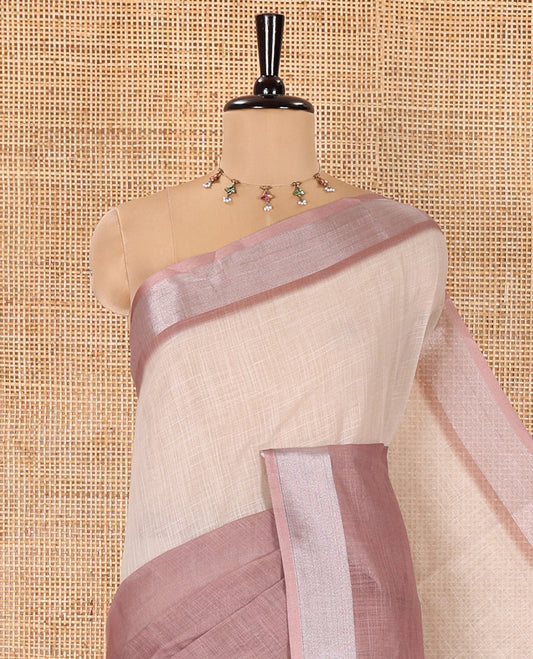 Cream and Brown Plain Linen Cotton Saree, Subtly Ombre-Style Dual-Color Dye on Its Body, Subtle Bavanji Zari Border, Pallu Features Rangoli-Style Patterns Print, and Paired with a Polka Dots Printed Blouse