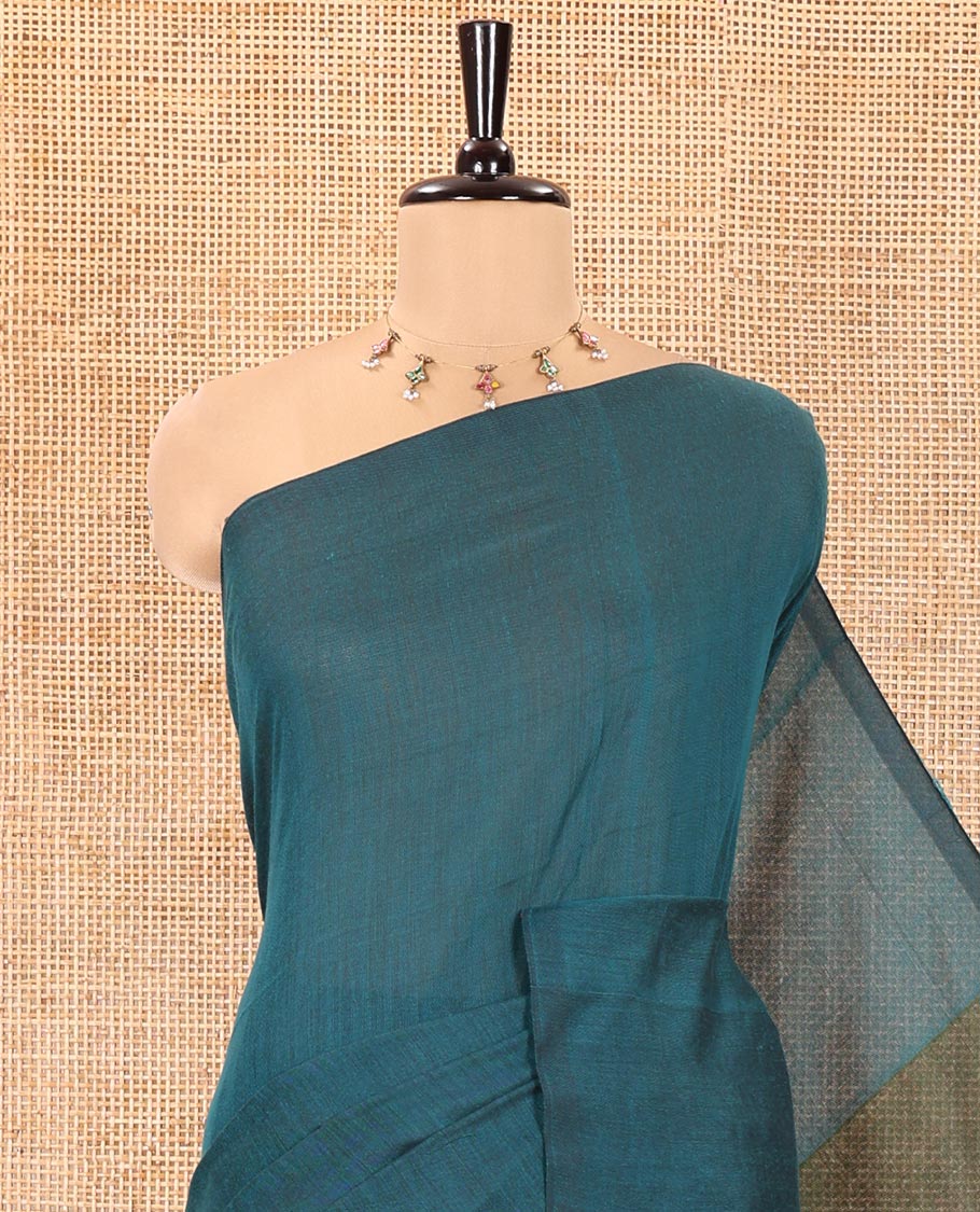Borderless Peacock Blue and Green Plain Khadi Mul Cotton Saree, Highlighted by Captivating Contrast Colored Pallu, and Paired with a Contrast Blouse