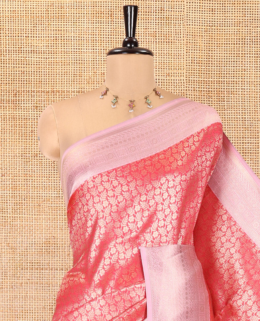 Rani Pink Kanchi Silk Saree, Gleamed Up with Floral-Leaf Jacquard Design on Its Body, Complemented by a Contrast Traditional Zari Design Border, Intricately Designed Pallu, and Paired with a Contrast Blouse