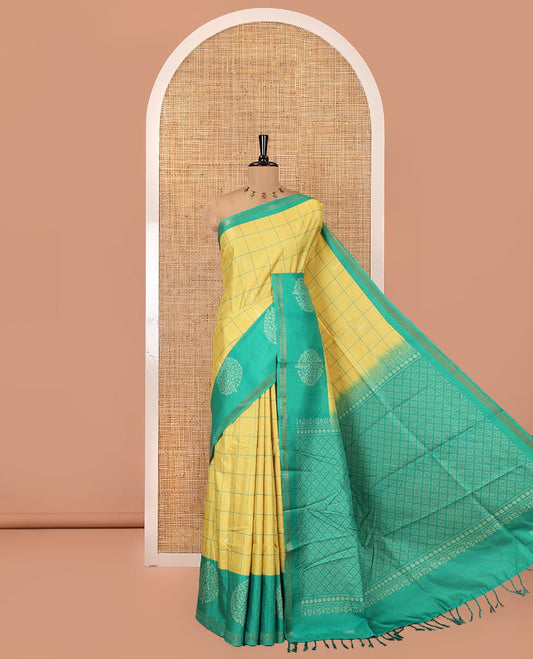 Yellow Katan Silk Saree, Embellished with Butta Enclosed Checks on Its Body, Complemented by a Contrast Border of Tree Motifs, Jaal Pallu, and Paired with a Contrast Blouse