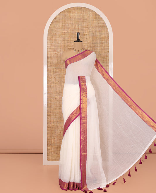 Cream Plain Khadi Mul Cotton Saree, Complemented by Contrast Traditional Zari Design Border, a Self-Pallu, and Has a Matching Blouse