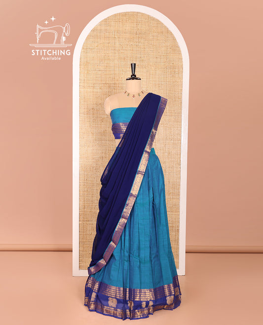 Blue and Dark Blue Sungudi Cotton Half-Saree Featuring Plain Skirt, Adorned with a Contrast Traditional Motifs Woven Zari Border of Annam Motifs, Paired with a Matching Blouse, and Contrast Syska Georgette Dhavani with Zari Border