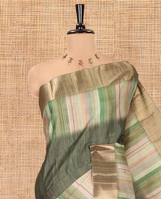 Olive Green Plain Fancy Tussar Saree, Highlighted by a Zari Bavanji Handbrush Painting-Style Striped Border, Striped Pallu, and Paired with a Matching Blouse