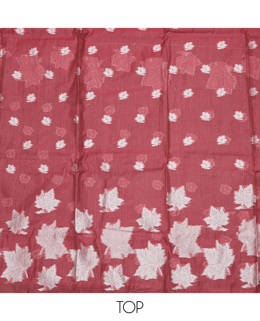 Pink material churidar set, leaf motifs top, plain bottom, and a dupatta steeped with leaf motifs