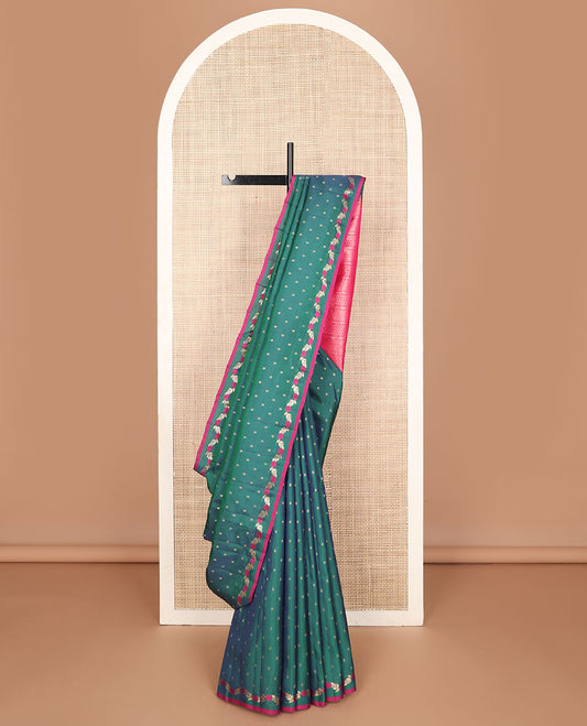 Green vasundhara elite saree with zari buttas, contrast floral creeper border & pallu steeped with banaras,vanki & then kuli kann