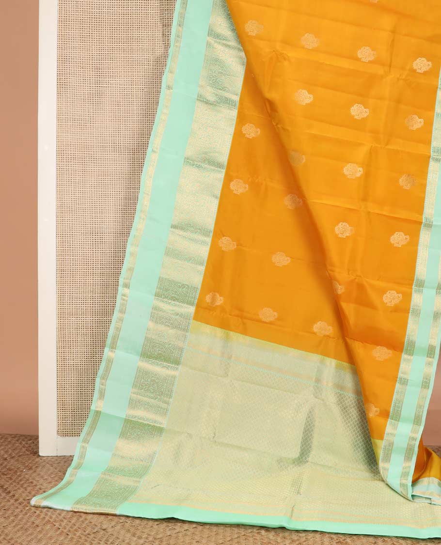 Orange zari buttas Vasundhara silk mix saree, contrast border rettai pettu of mayil designs, and jaal pallu